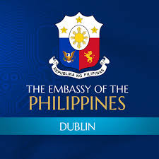 Graphic of the Embassy of the Philippines Dublin logo on a blue background with Dublin on a light blue banner and a crest at the top of the Republic of the Phillipines.